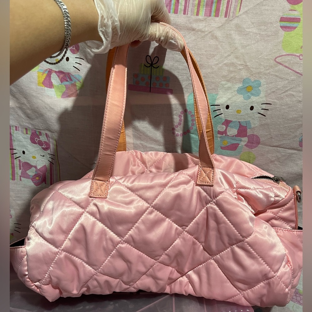 Pink quilted duffle bag